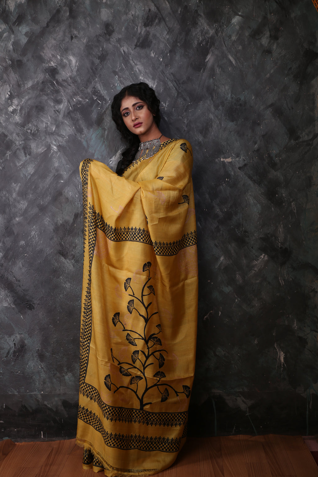 Mustard Yellow Color Tussar saree with black prints